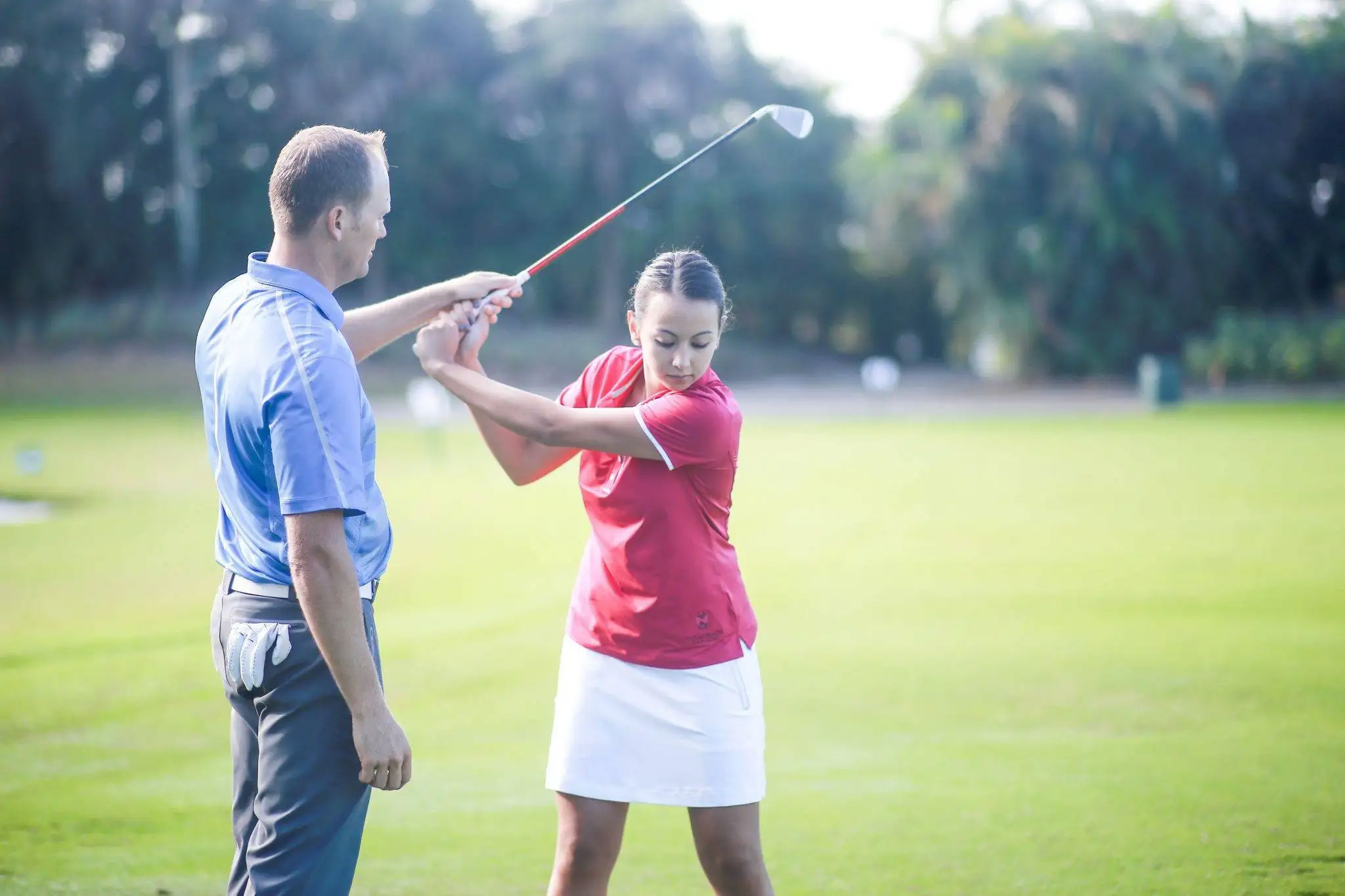 Mark Durland coaching a student at CAVU Golf Club